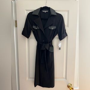 Never worn black Sharagano dress in size 4.